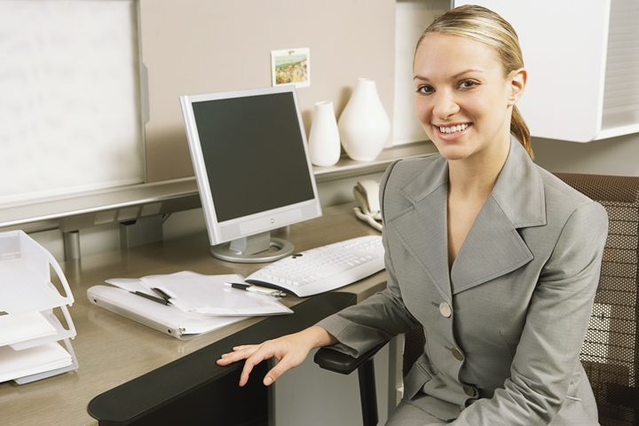 Receptionist in front of computer