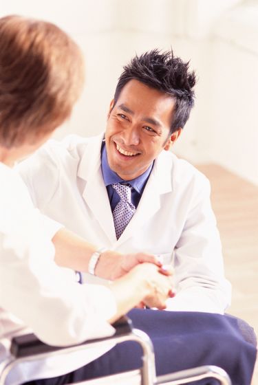 Doctor talking with patient