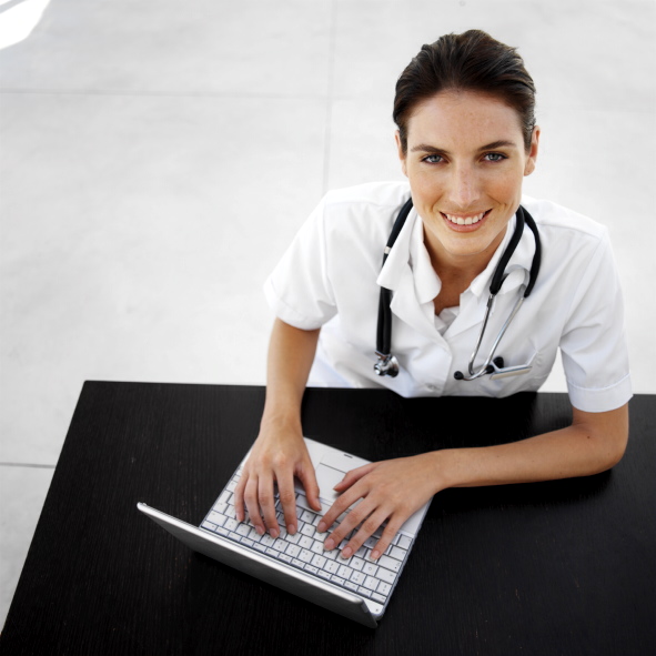 Female Physician at Computer