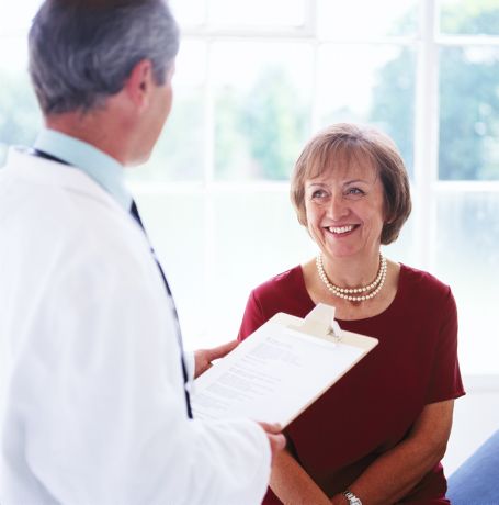 Doctor talking to patient