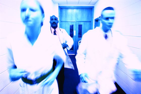 Physicians Running in Hallway