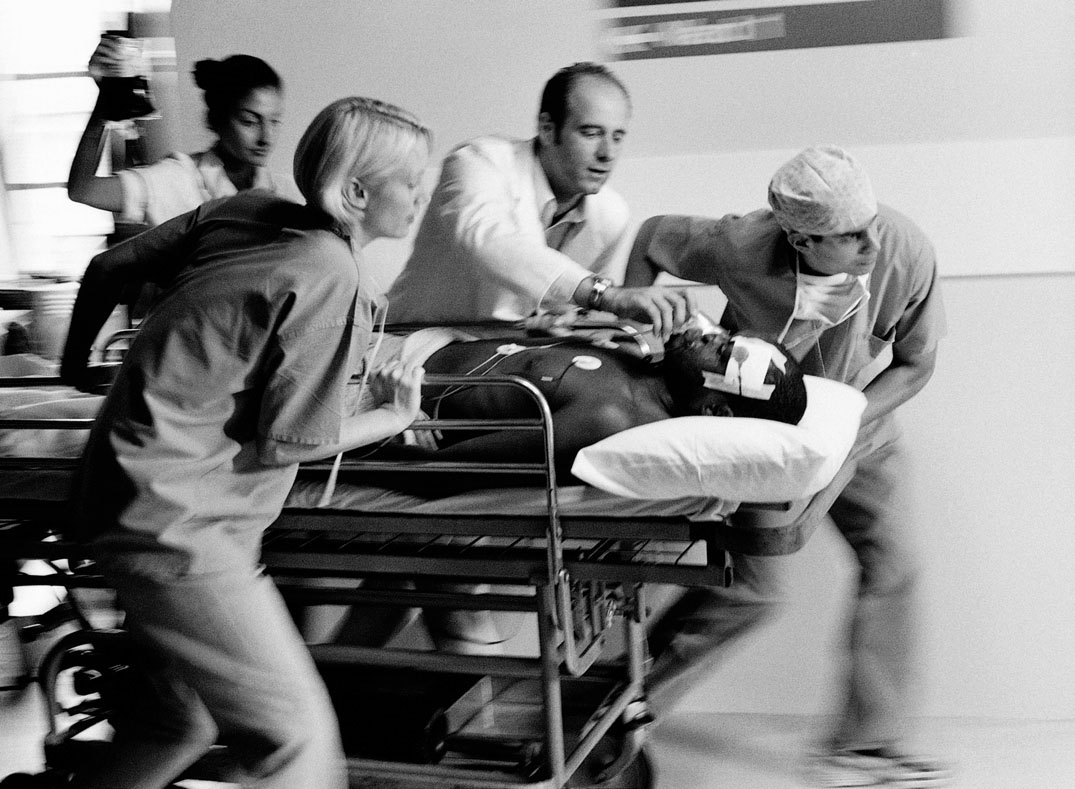 Patient being rushed into the ER