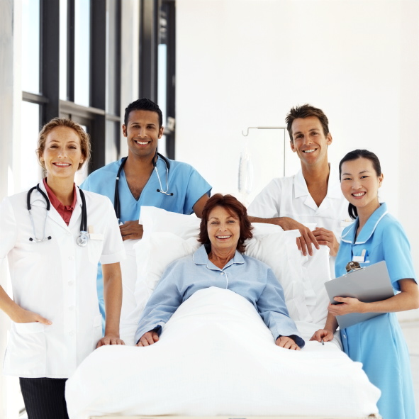 Patient surrounded by medical team